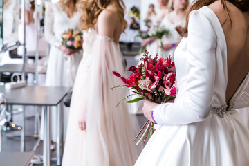 Competition of wedding stylists. Models in wedding dresses and hairstyles are waiting for the...