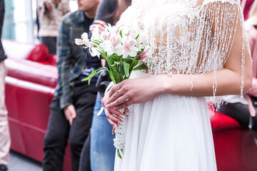 Beautiful delicate bouquet in the hands of the bride. wedding exhibition