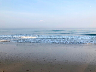 beach, palm trees and Andaman sea in Thailand on Phuket island