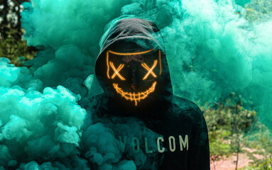 neon mask in smoke