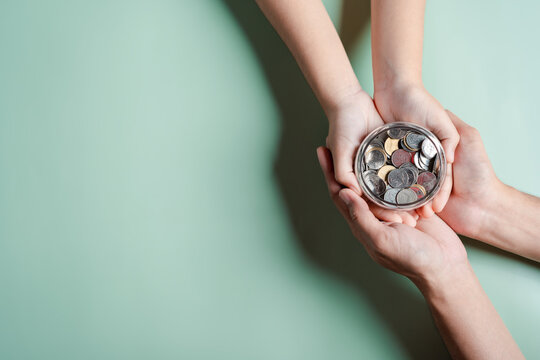 Hands Of Adult And Child Holding Money Jar, Donation, Saving, Fundraising Charity, Family Finance Plan, Inflation, Superannuation, Investment, Retirement Concept