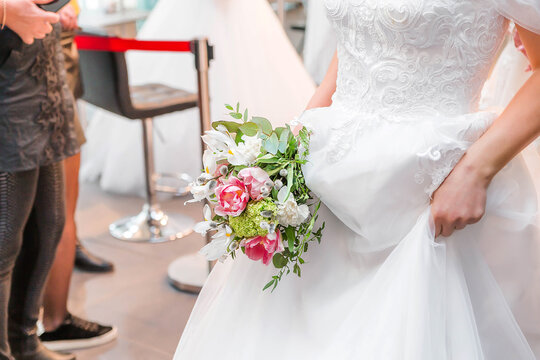 Beautiful delicate bouquet in the hands of the bride. wedding exhibition.