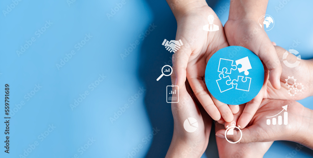 Aufkleber hands holding jigsaw solution business target planning development leadership and customer target gr