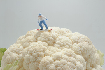 a figures of snowboarder on Whole Cauliflower Vegetable