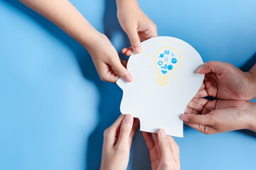 Hands holding light bulb with business target planning development leadership and customer target group, investment growth and success development, achievement, goal, strategy, finance concept.
