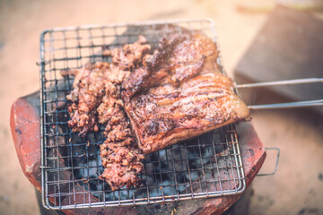 Grilled meat on grill iron. Carcinogenic food.