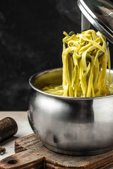 I boil the pasta which put salt and olive oil inside water in the pot