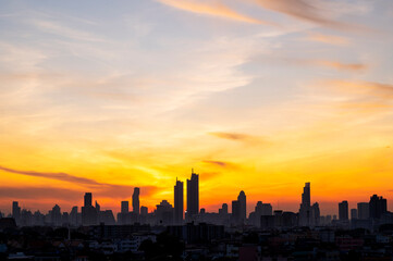 cityscape of Bangkok city skyline silhouette with sunset sky background, Bangkok city is modern metropolis of Thailand and favorite of tourists