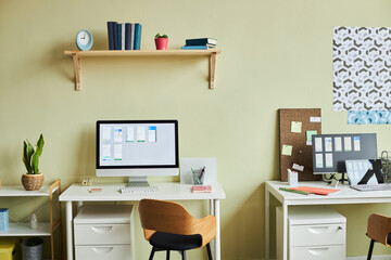 Background image of cozy office interior with pale yellow wall in designer agency, copy space
