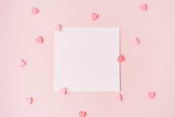 Blank square wish list with hearts on pink background.