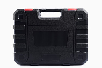 Black toolbox isolted on white background. Closed plastic case for repairman, close up