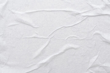 Obraz premium Texture of crumpled wet white paper with folds. writing paper