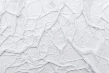 Obraz premium Texture of crumpled wet white paper with folds. writing paper
