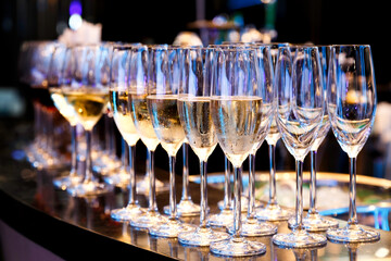 Champagne Flute Glass and wine glass on the bar counter ready to serve and drink in the party....