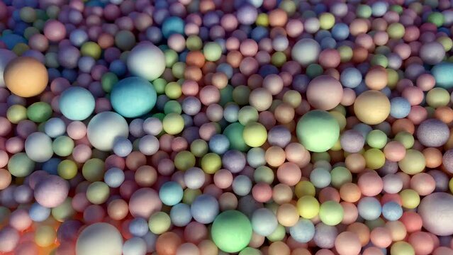 Many colorful rainbow foam balls balloons. Pile of multicolor spheres rolling, falling and flying.