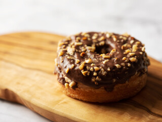 Peanut and chocolate topping donuts
