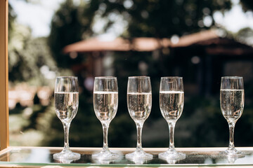 buffet, champagne glasses, champagne bubbles close-up