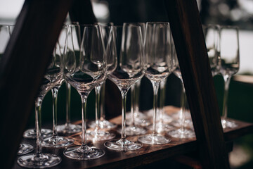 many empty clean shiny elegant glasses for alcohol