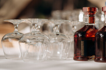 many empty clean shiny elegant glasses for alcohol