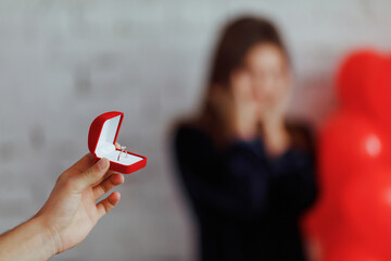 Close up. Man makes proposal of marriage to girl. Love story.