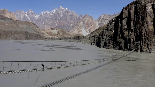 Handheld shot of  Hussaini suspension bridge in Gilgit baltistan Pakistan. 