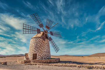 Puerto los Molinos wind mill on the west coast of Fuerteventura,   Spain - obrazy, fototapety, plakaty