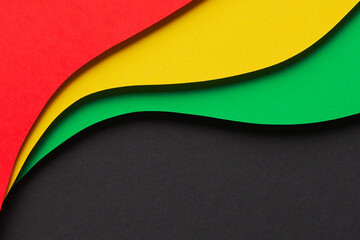 Black History Month color background. Abstract geometric black, red, yellow, green color background.