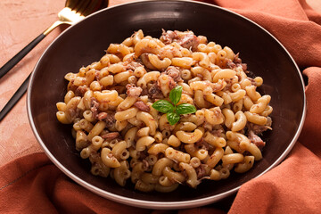 Pasta with stewed meat, pasta in the navy, horns, homemade, no people,