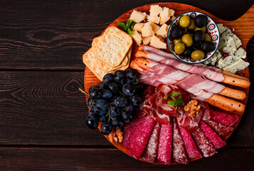 Appetizer, assortment, set, sausage, and cheese, on a wooden board, top view, no people,