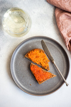 Toasts with red caviar
