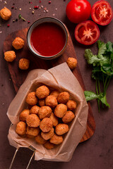 Chicken popcorn, deep fried, nuggets, close-up, rustic, no people,