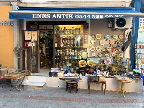 Istanbul, Turkey - 08.01.2023. Enes Antique shop facade located at Tellalzade sokak street. Moda district street view in Istanbul. Kadikoy area of Anatolian park of Istanbul. Asian part.Moda area in K