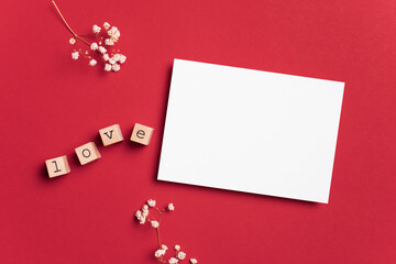 Valentines Day greeting card mockup with love letters on red