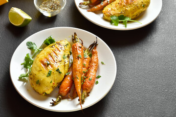 Roasted chicken breast with carrots