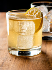 Whiskey sour. Classic Cocktail. Mixed drink with whiskey, lemon juice, sugar, and optionally, a dash of egg white. It is a type of sour, a mixed drink with base spirit, citrus juice, and a sweetener. 