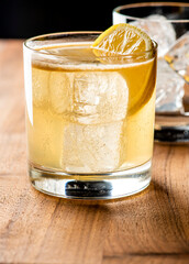 Whiskey sour. Classic Cocktail. Mixed drink with whiskey, lemon juice, sugar, and optionally, a dash of egg white. It is a type of sour, a mixed drink with base spirit, citrus juice, and a sweetener. 
