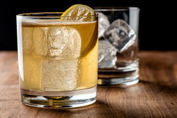 Whiskey sour. Classic Cocktail. Mixed drink with whiskey, lemon juice, sugar, and optionally, a dash of egg white. It is a type of sour, a mixed drink with base spirit, citrus juice, and a sweetener. 