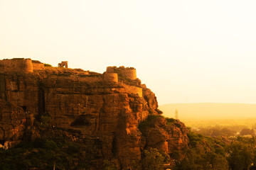 Fototapeta na wymiar The beauty of Badami cave temples during sunset, view from vantage point.