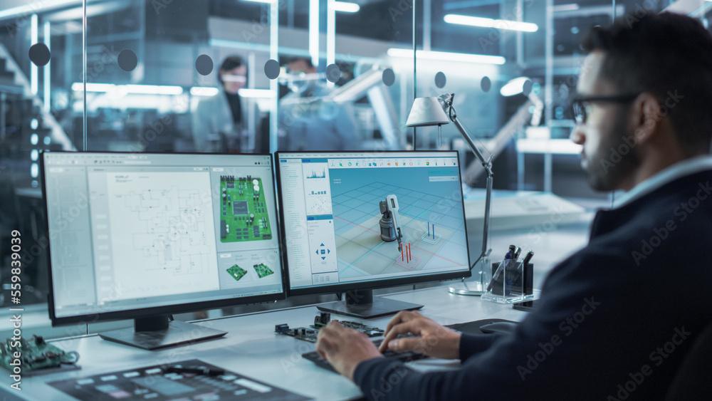 Poster Portrait of a Young Hispanic Industrial Engineer Developing 3D Model of a Circuit Motherboard on Computer CAD Software in a Factory. Modern Technological Research and Development Center.