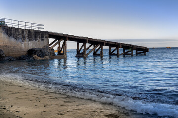 Fototapeta na wymiar pier on the beach, sea, ocean, blue water, old pier