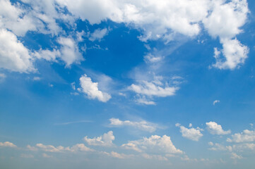 Blue sky and cumulus clouds.