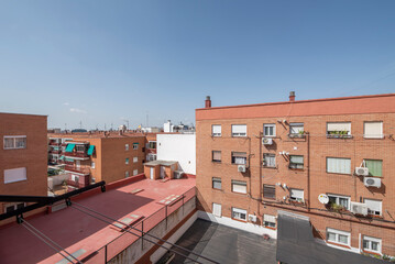 Image of facades, roofs and rooftops with chimneys and television antennas
