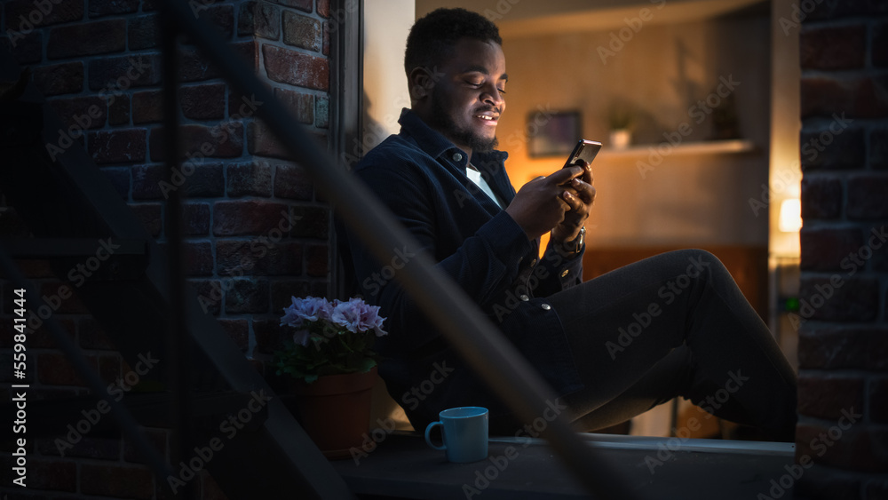 Poster happy black man using smartphone to browse funny online content or chat with friends on social media