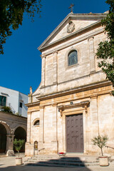 Facade and door of the Church Rectory Oratory of Our Lady of Sorrows in Locorotondo, Italy. It was built in 1858 and is located between the current via Giannone and via Addolorata Vecchia.