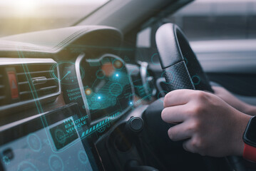 a futuristic vehicle and a graphic user interface (GUI). connected, intelligent vehicles "Internet of Things" heading-up display (HUD)