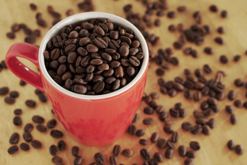 coffee beans in a cup on table