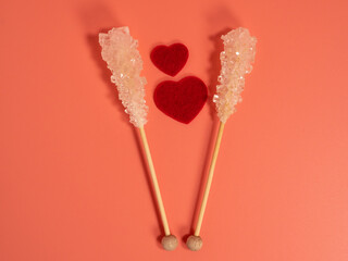 Red color heart on a pink background.