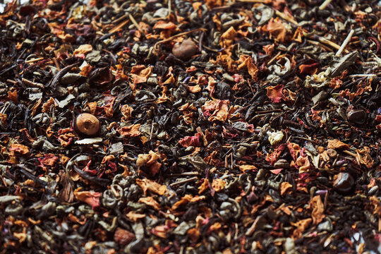 Dry tea leaves on surface