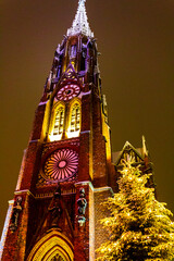 Big church illuminated at Christmas market Bremerhaven at night Germany.