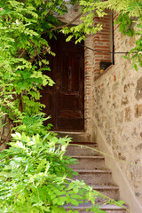 Entrance of an old house in the Montemerano, Grosseto, Tuscany, Italy. 